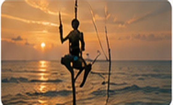 Traditional stilt fisherman at sunset
